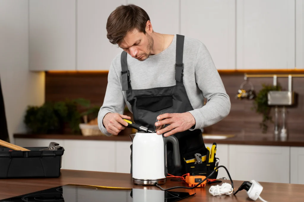 Bora appliance repairs technician servicing premium kitchen appliances
