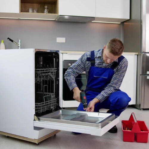 Technician repairing a Haier dishwasher in Sydney
