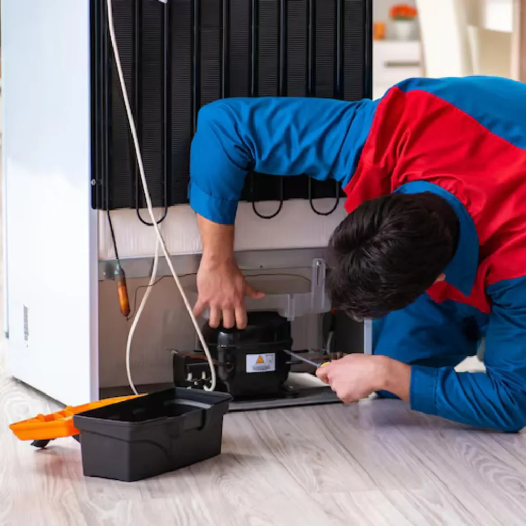 Technician repairing a Haier appliance in Sydney